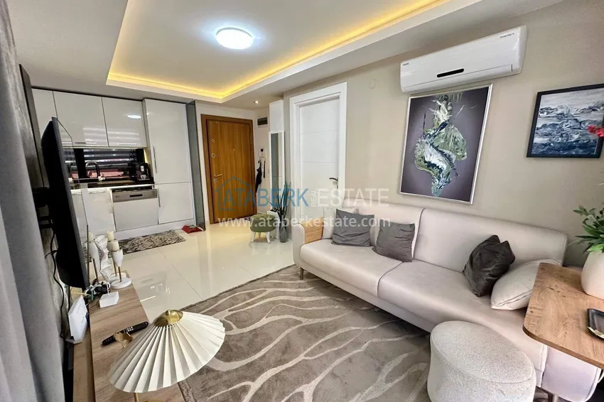 Kupuj  Nieruchomość w centrum Alanyi - apartament 1+1 z nowymi meblami, plaża Keykubat 1 