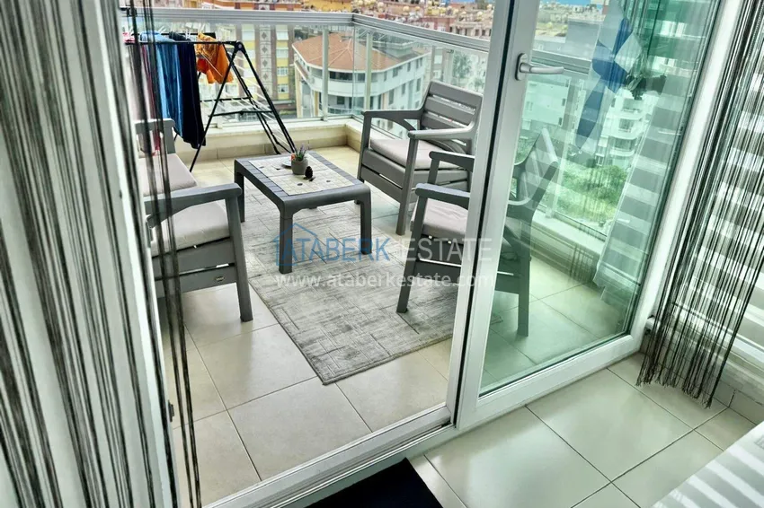 Kupuj  Apartament 1+1 w Tosmur, 76 m2 z meblami i widokiem na morze - nieruchomość na zezwolenie na pobyt w Alanyi  10 