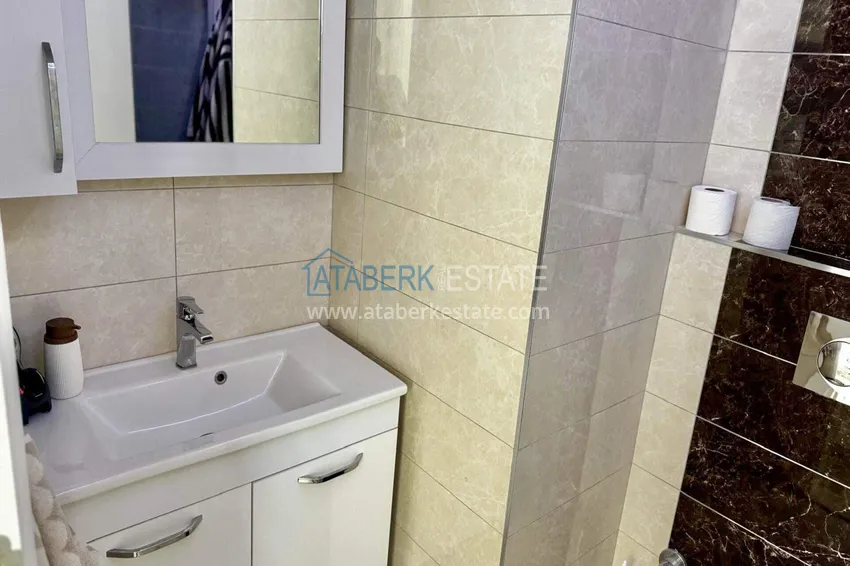 Kupuj  Apartament 1+1 w Tosmur, 76 m2 z meblami i widokiem na morze - nieruchomość na zezwolenie na pobyt w Alanyi  14 