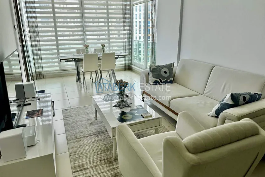 Kupuj  Apartament 1+1 w Tosmur, 76 m2 z meblami i widokiem na morze - nieruchomość na zezwolenie na pobyt w Alanyi  4 