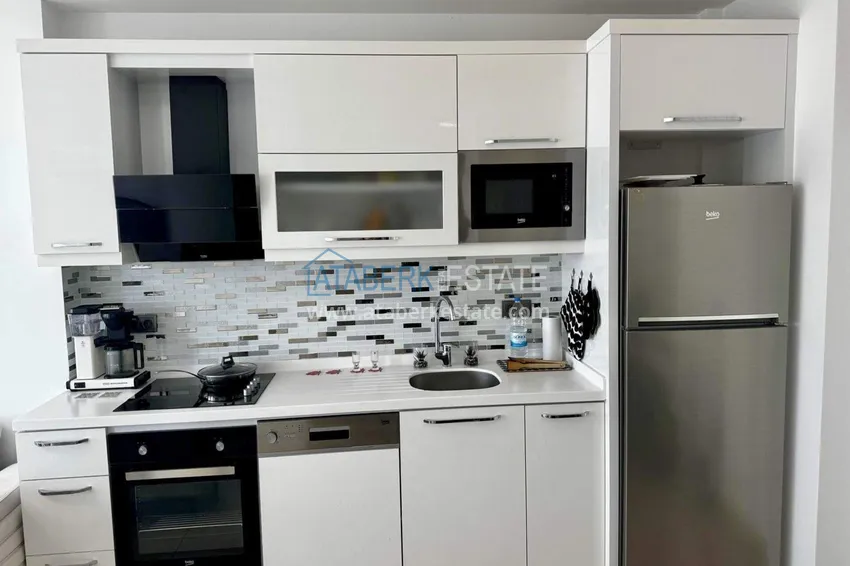 Kupuj  Apartament 1+1 w Tosmur, 76 m2 z meblami i widokiem na morze - nieruchomość na zezwolenie na pobyt w Alanyi  7 