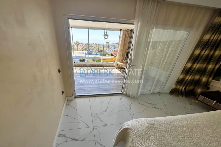 Kupuj  Apartament 1+1 w Alanya, dzielnica Cikcilli - umeblowany i z widokiem na morze, przeszklony balkon  14 