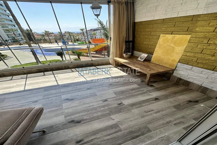 Kupuj  Apartament 1+1 w Alanya, dzielnica Cikcilli - umeblowany i z widokiem na morze, przeszklony balkon  17 