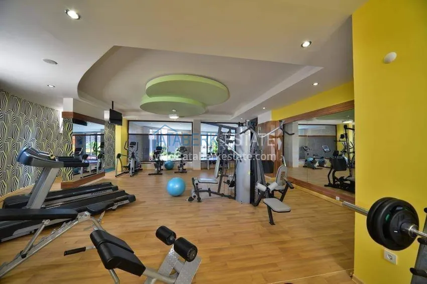 Apartament 1+1 w Alanya, dzielnica Cikcilli - umeblowany i z widokiem na morze, przeszklony balkon  19 