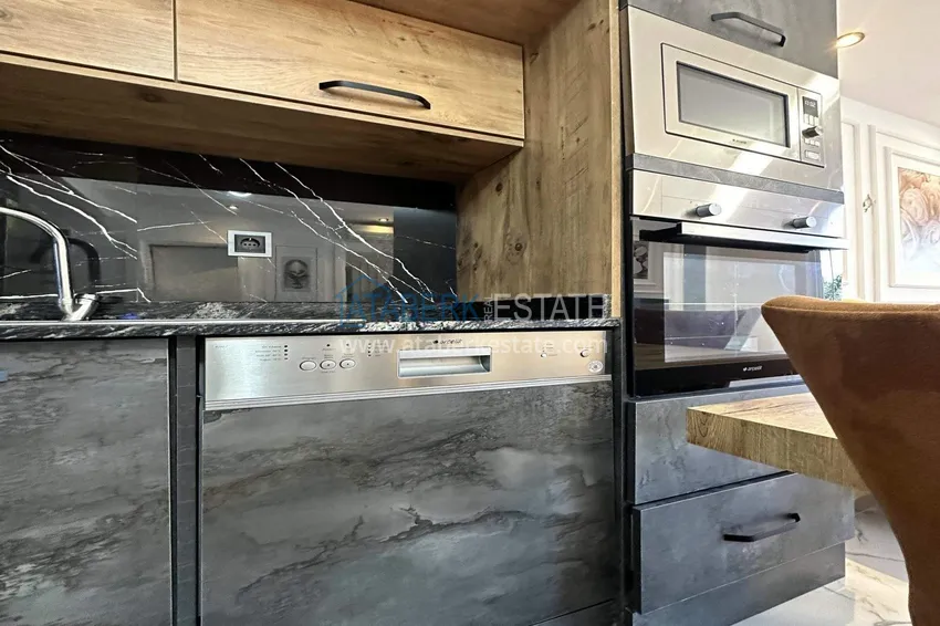 Kupuj  Apartament 1+1 w Alanya, dzielnica Cikcilli - umeblowany i z widokiem na morze, przeszklony balkon  5 