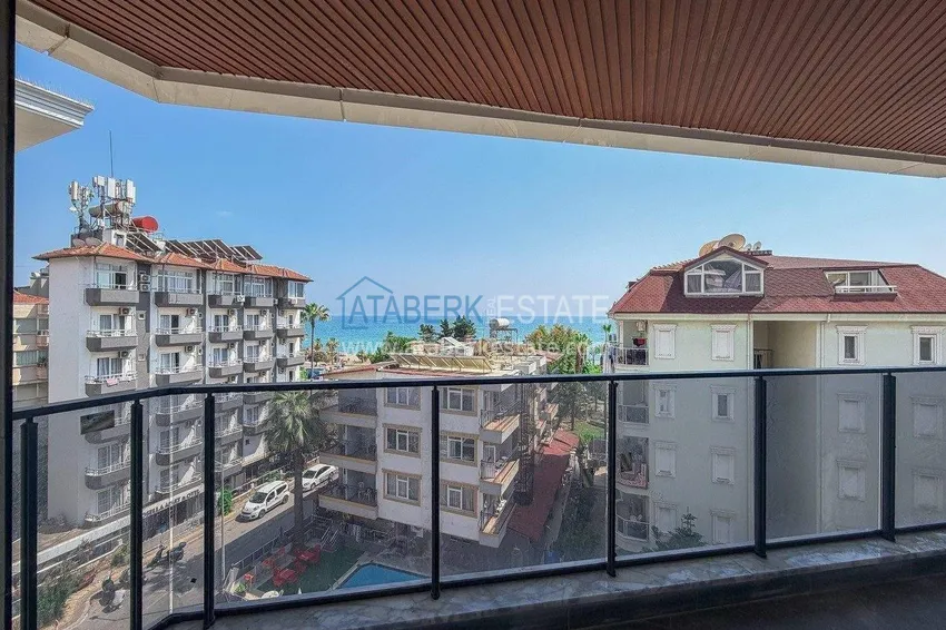 Kupuj Panoramiczny dwupoziomowy penthouse 4+1 w centrum Alanyi — pierwszy nadbrzeżny, odpowiedni dla obywatelstwa 29 
