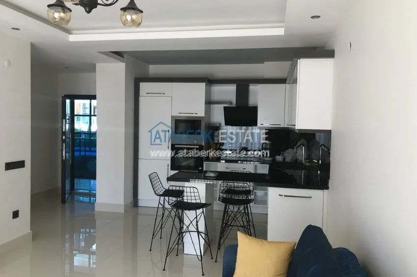 Kupuj  Apartament 1+1 umeblowany z dużym tarasem w nowoczesnym kompleksie 3 