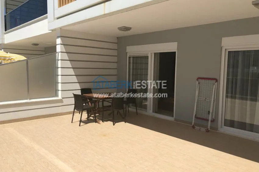 Kupuj  Apartament 1+1 umeblowany z dużym tarasem w nowoczesnym kompleksie 8 