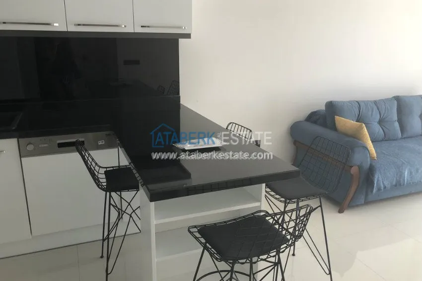 Kupuj  Apartament 1+1 umeblowany z dużym tarasem w nowoczesnym kompleksie 10 