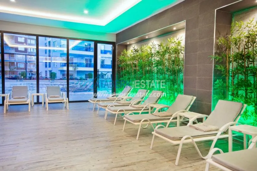 Apartament 1+1 umeblowany z dużym tarasem w nowoczesnym kompleksie 10 